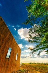 a building in the middle of a field